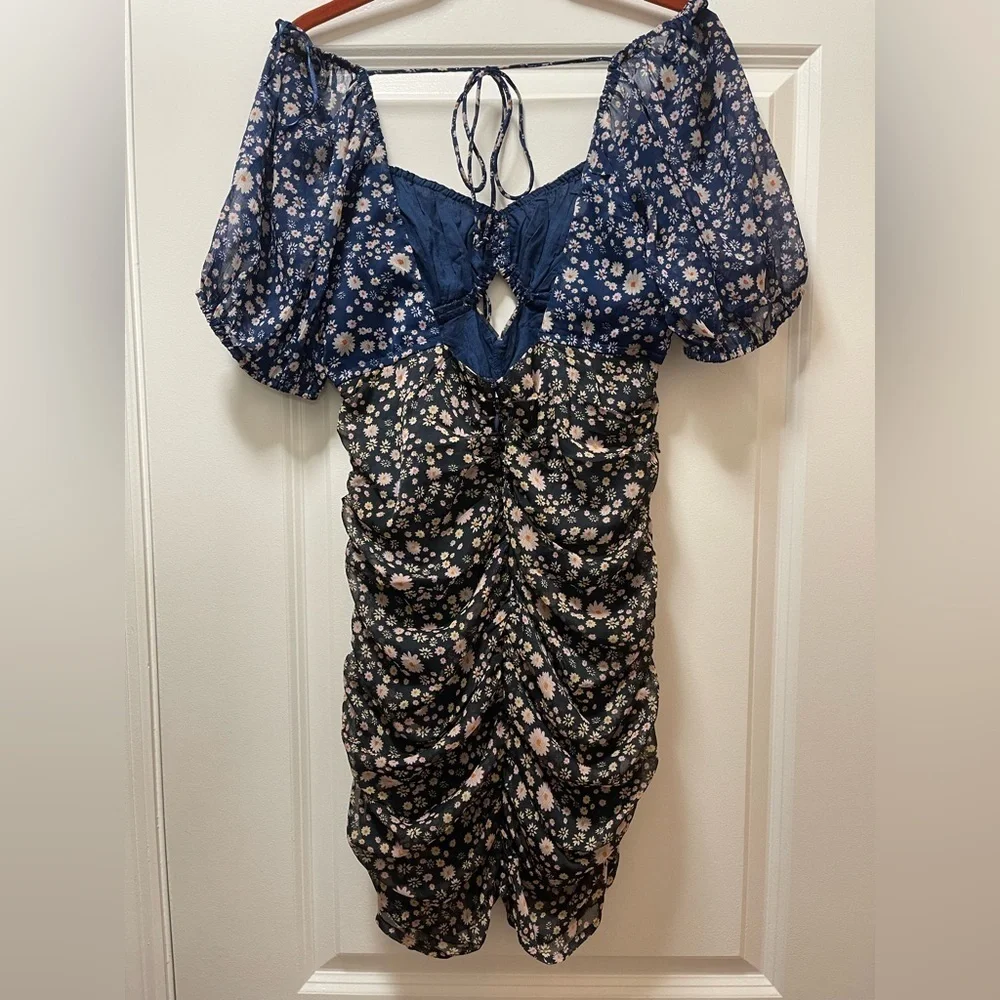NWOT  Free People Tessa Dress. Size Small. Color is Night Combo